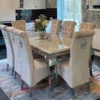 Louis Marble & Chrome Dining Table With Lucy Slim Quilted Lion Knocker Velvet Chairs