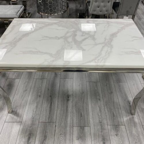 Louis White Marble Dining Table on display